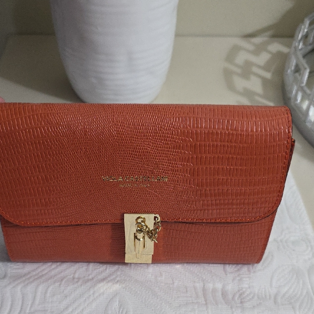 Sleek Red Textured Clutch by Michael Kors